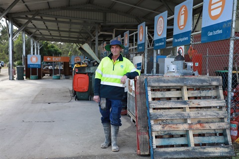 a man in a recycling centre