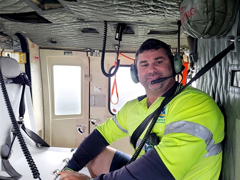 Dan Powick looking over the flood damage