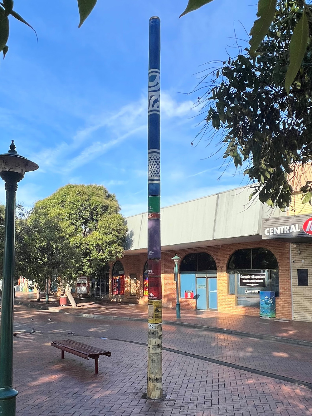 The flood marker pole in the Clyde Street Mall