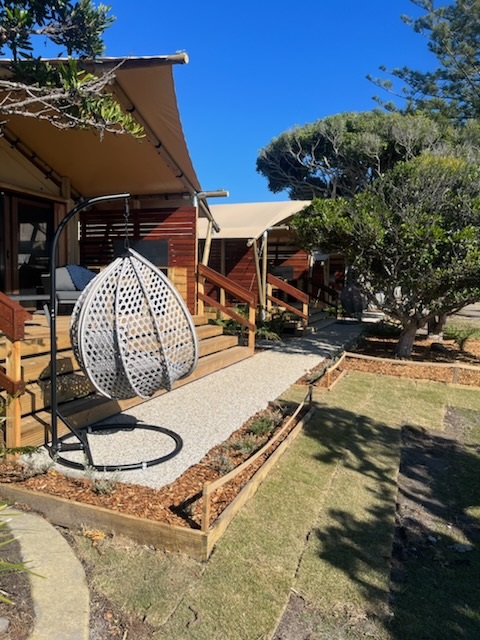 Crescent Head safari tents with hanging chair