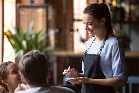 Waitress taking order