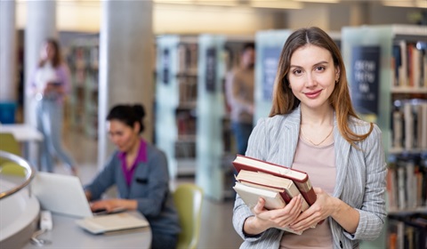 student with books