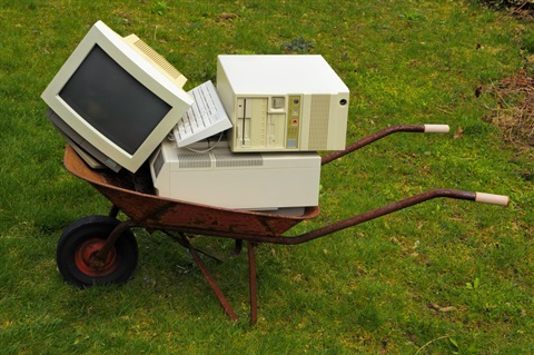 Old computers in a wheelbarrow